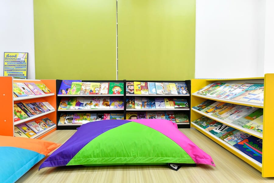 Reading corner with bean bags and book shelves